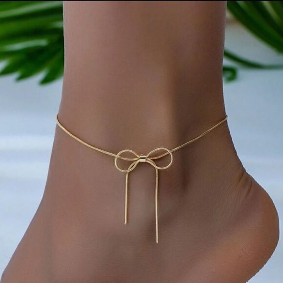 Anthropologie Jewelry - Gold bow anklet  #1036